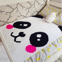 This adorable and cartoony panda has the cute face of a true Kawaii creature. The blanket is crocheted using the C2C method. The pattern comes with a diagram and picture-guide explaining C2C crocheting. Enjoy! Design: Jennifer Santos