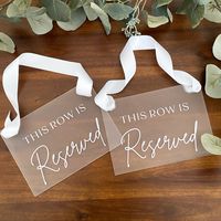 Our elegant and practical reserved row sign was designed specifically with your wedding ceremony in mind! Our beautifully crafted sign adds a touch of sophistication and functionality to your wedding ceremony. Choose from 5x7, 8x10" rectangular or 8x12" scalloped acrylic signs - large enough to be noticed by your guests to alert them that this row is reserved without being overwhelming! Our signs can easily be placed on any chair or row, providing clear indication to your guests that these seats