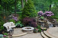 Traditional Landscape/Yard with Fire pit, Hydrangea - Forever Pink, exterior stone floors, Fountain, Pond