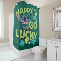 Happy St. Patrick's Day from Stitch! This fun graphic features Stitch in a pot of gold and the text, "Happy Go Lucky."