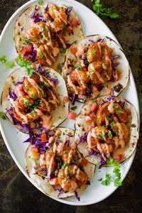 Bang Bang Shrimp are crispy, creamy, sweet, and spicy. They are so satisfying served as Bang Bang Shrimp Tacos drizzled with the famous sauce