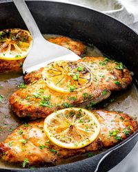 This Chicken Francese is a classic Italian-American chicken dish, that's incredibly easy to prepare and cook. It's so delicious it will become a staple in your weeknight dinner rotation! I'm talking gourmet chicken right at home, in only one pan and 30 minutes! #chickenfrancese #chicken #onepan #30minutes