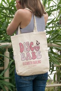 Looking for the perfect bachelorette party gift? Look no further than this Disco Bride Nashville Tote Bag! This bag is perfect for carrying all of your wedding party favors and accessories. It's also great for holding your bridal gown, veil, and other accessories. Plus, it makes a great retro bachelorette party accessory. So don't wait any longer - order your Disco Bride Nashville Tote Bag today!