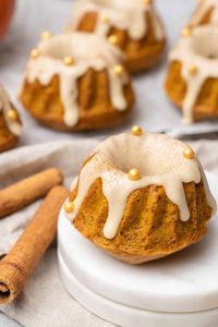 mini pumpkin bundt cakes with maple glaze.