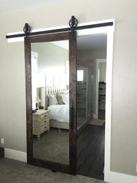 LOVE this mirrored barn door for a master bedroom!