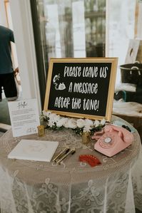 Danielle and Cody used After the Tone, the best audio guest book out there - selecting an antique pink rotary phone for their guests to use to leave audio messages for them instead of writing in a guest book. We loved this choice! For more of this Wisconsin Camp Wedding, explore the blog.  Photo by Chloe Ann Photography #afterthetone #audioguestbook #wisconsinwedding