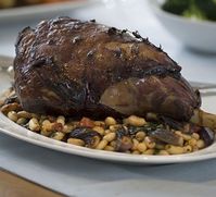 Roast red wine lamb with Italian beans