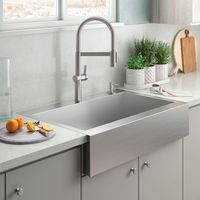 The Vault apron-front kitchen sink combines the sleek, modern look of stainless steel with the traditional farmhouse style. Made to seamlessly coordinate with a variety of decors, this sink features a single bowl with tightly angled corners to maximize basin space, and a top-mount design for easy installation and use on most laminate countertops. Vault's ultra-flat rim makes it easy to wipe from the counter directly into the sink. KOHLER Vault Farmhouse Apron Front 35.75-in x 24.31-in Stainless Steel Single Bowl 2-Hole Kitchen Sink | R3942-2-NA