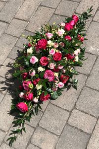 Pretty pinks in this beautiful double ended funeral coffin spray, created by Signature Flowers Bucks and Oxon.  #funeralflowers #bespokeflowers #bespokefuneralflowers #bicesterflorist #oxfordshireflorist #sayinggoodbye #coffinspray