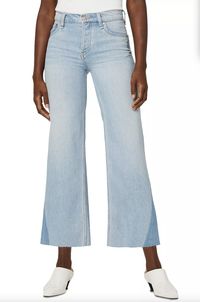 Introducing the Hudson Rosie High Rise Wide Leg Jeans in Blue Spring – the perfect statement piece for any fashion-forward wardrobe. These jeans feature a high rise fit and a wide-leg silhouette with a 20" leg opening, creating a stylish and flattering look. The contrast stitching and silver-tone hardware add a touch of edge, while the faded and whiskered detailing gives these jeans a vintage vibe. Bloomingdale's affiliate.