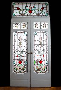 Entry from Light room to Glass room... A PAIR OF ART DECO PAINTED PINE STAINED GLASS CONSERVATORY DOORS WITH OVERDOOR. Circa 1930.