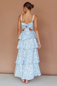 Love this floral dress for a summer wedding! the tiered ruffles are so feminine and chic!