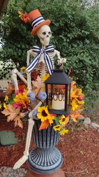 So many skeletons, so little time! Here is another fall themed skeleton just waiting to find a new home. I love the sunflowers that I added to this one!