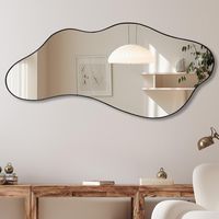 PRICES MAY VARY. Size: Black framed wavy mirror measures about 47.2 x 21.6 inches. The wall mounted mirror can be easily installed individually Suitable Scene: The irregular shape mirror is suitable for various decoration styles and improves the overall taste of decoration. This wall mirror is a perfect home decoration for fireplace, living room, dining room, vanity, entryway and so on Easy Hanging: The odd shaped mirror has hooks on the back panel to hang vertically and horizontally on the wall