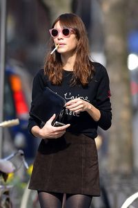 Alexa Chung seen out and about carrying a cigarette at Soho in New York City.