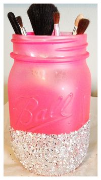 Painted and glitter dipped mason jar as a makeup brush holder. Cute!