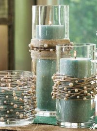 DIY  (photo only) string pearls on thread separate from twine and wind both around vases or candle holders.