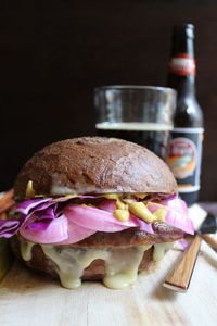 The Ultimate Limburger and Bratwurst Sandwich. Toasted rye bread with melted Wisconsin Limburger cheese, Dijon mustard, grilled bratwurst, and a raw red cabbage slaw for some bite and texture, this sandwich has it all.