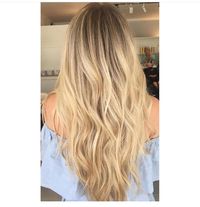 Warm butter blonde with shadow root