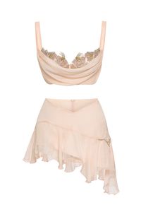 Silk Chiffon Set, inspired by the blooming Japanese Sakura Flowers. - Pure silk and silk chiffon - Handmade embroidery- Lace up back for the top- Hidden zipper for the skirt Composition: 100% Silk Model wears size 36. True to size.