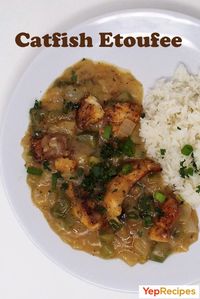 A Cajun dish consisting of vegetables stewed in a light brown roux with seasoned catfish and served with rice. #YepRecipes #fish #catfish #Cajun