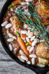 My Easy Cassoulet is a pared down version of the classic French dish and it's perfect for laid back entertaining or a romantic dinner for two! #dinner #french #skilletdinner #onepotdinner #romantic #chicken #beans #sausage #glutenfree