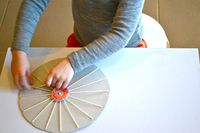 Circular weaving using a cardboard frame...looks so neat.