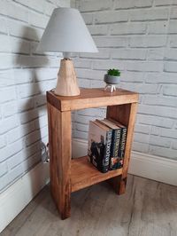 This Rustic side table/bedside table has been handmade in our workshop located in the Peak district. It can have a number of uses whether it is a side table, bedside table, lamp stand, hallway unit etc, comes complete with a shelf. This tall, side table was made from chunky, 4cm thick, reclaimed Pine timber and has been screwed and plugged to hide the screws. It comes in a choice of 3 wax colours which can be selected from the drop down menu, see picture number 5 for colours from top to bottom: