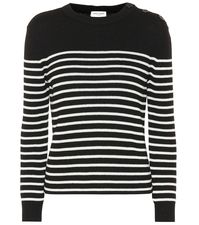 Take casual looks in a classic direction with this timeless striped sweater from Saint Laurent. Made in Italy from a cotton and wool knit, the design is finished with nautical flair with button details skirting over one shoulder.