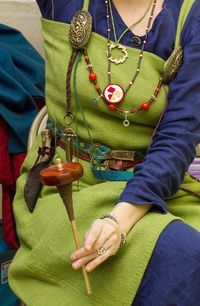 An SCA Viking (note the necklace), but I love the colour combo, the weave of the smokr fabric (she wove it herself), and the grooming set hanging from a length of whipcord.