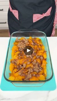 3M views · 1.6K comments | My mom taught me this easy dessert | My mom taught me this easy dessert

Kyra makes a peach cobbler dump cake that is perfect for fall. | By Kyra Dawn | Alright, that was my large can
of sliced peaches in syrup. That was fun. Okay. Now, we
have our dark brown sugar and I'm just going to stick my
hands right in here. We're going to put about one cup of
brown sugar on here for this delicious and easy recipe. I
also drained these peaches so we wouldn't have too much
liquid in here. Now, I have some sugar and cinnamon. Just
going to sprinkle a nice amount of this all over these peaches.
We have a lot of peach is here. So we're going to go in with a
nice heavy amount. Now I have some ground cinnamon. This is
absolutely essential for this recipe and we're going to put 