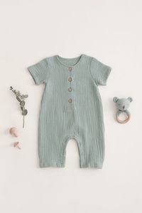 This organic cotton muslin jumpsuit is soft and breathable is a staple for your baby’s closet, ideal for warm summer days. Features a soft sage tone that is gender-neutral and stylish. Made with 100% organic cotton that is good for your baby and good for the environment.