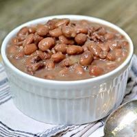 The Secret to Perfect Old Fashioned Pinto Beans with Pinto Bean, Olive Oil, Small Yellow Onion, Garlic, Applewood Smoked Bacon, Salt, Chicken Broth, Bay Leaf.