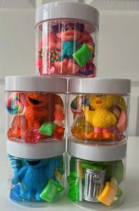 Choose how many party favor jars you would like below My Itty Bitty Sesame Street Party Favor Jars come with homemade play dough, a Sesame Street character, candy charms, and colorful rocks. Items will vary. *Play dough is made with flour, water, salt, cream of tartar, vegetable oil, and food coloring. WARNING: Choking Hazard. Sensory kits contain small parts. Kits are recommended for ages 3 and up.