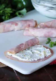 Rolling Up Pineapple Ham Roll-Ups Image