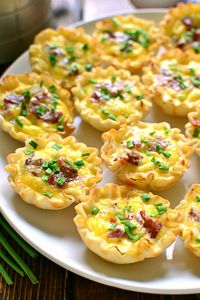 Quiche Lorraine Bites are packed with all the delicious flavors of Quiche Lorraine, and perfect for serving at a breakfast, brunch, or even cocktail party! They can be served right out of the oven or at room temperature....either way, they're completely delicious!