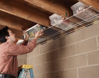 Take advantage of your exposed beams with wire shelves. | 51 Game-Changing Storage Solutions That Will Expand Your Horizons