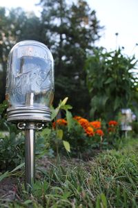 Solar Powered Mason Jar Lights ( Etsy :: http://www.etsy.com/listing/77002111/solar-powered-mason-jar-lights-eco )