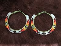 Authentic Beautiful Native American Indian Jewelry Navajo Zuni Hand Beaded 2.25 inch Hoop Earrings Great for a  Gift❤️ Handcrafted by Navajo Artist H. Crosby  Present in virtually every Native American tribe, the feather symbol is universally recognized as a representation of trust, strength, wisdom, freedom, and honor. Incorporated into many sacred pieces of Native American wear, the feather is easily one of the most respected symbols.