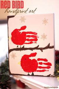 kid craft: red bird handprint art perfect for a Mother's Day gift #handprint #Mother'sDay #kidcraft | thecelebrationshoppe.com