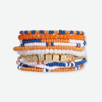 Show your team spirit with our curated Game Day bracelet stack. It features 10 strands of seed bead bracelets and a brass friendship bracelet sporting the word "GAMEDAY".