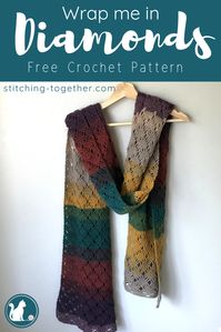 The Wrap me in Diamonds crochet scarf is the perfect fall accessory. You're friends will be begging you to make them this gorgeous crochet wrap. #stitchingtog #crochet #crocheting #crochetscarf