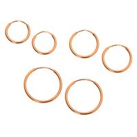 18kt Rose Gold Plated Graduated Sleek Hoop Earrings, 3 Pack ($22.99, $13.79) • 18kt gold plated. Finish: Rose gold tone. Diameter: 10MM, 12MM, 14MM. Closure: Infinity loop. Material: Metal. 3 pairs of 18kt rose gold plated hoops in different sizes. | claires.com/us