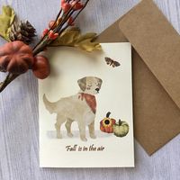 "Personalized Watercolor Fall Card with Dog, Fall Dog Card, Card Set, Fall Cards, Thanksgiving Card with Dog, Handmade card, Watercolor Card OPTION TO PERSONALIZE! YOU MAY PURCHASE ONE CARD OR A SET HANDMADE FOLDED CARDS AND ENVELOPES YOUR CHOICE OF ENVELOPES: Cream or Kraft Each card measures approximately 5.5x4.25 inches (when folded). Beautiful watercolor art printed on cream premium 110 lb cardstock. Cozy Fall Design with dog. \"Fall is in the air\" sentiment is shown printed on the front. C