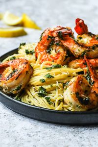 Easy and elegant Lemon Spaghetti with Shrimp. This bright and flavourful lemon pasta dish is tossed with pan seared jumbo shrimp that are marinated in an Italian gremolata sauce.