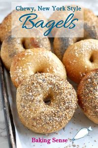 These Overnight Bagels are chewy, crusty and properly dense New York style bagels. The overnight rise creates the perfect texture and flavor - and you'll have fresh, hot bagels for breakfast or brunch less than an hour after getting out of bed. Now all you need is a schmear of cream cheese! #recipe #homemade #new york #how to #authentic #scratch #boiled #easy #best #chewy #baking sense