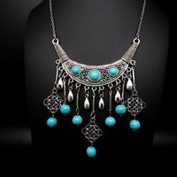 Bring your style to life with this unique, one-of-a-kind Viking hand-mounted necklace for women. The Turquoise stone and metal beads add a touch of power while the 52cm long stainless steel chain symbolizes strength and determination. Show your passion for Viking culture with this bold piece of jewelry!