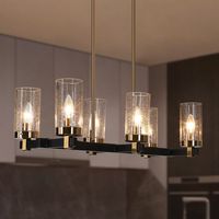 Elevate your kitchen's ambiance with this sophisticated 6-light island chandelier. Its sleek design features a metal frame in a stylish matte black and plated brassy gold finish, complemented by cylinder seeded glass shades that add a touch of elegance. Measuring 27 inches in length and 12 inches in width, its height can be adjusted from 15.5 inches to 65.5 inches, making it a versatile choice for both low and high ceilings. This black gold pendant light requires six E12 40W bulbs (not included) and is fully dimmable when paired with compatible dimmers and bulbs (also not included), allowing you to adjust the lighting to suit any mood. Enjoy peace of mind with free replacements for any broken or missing parts. Enhance your home with this beautiful and functional dining room lighting fixtur