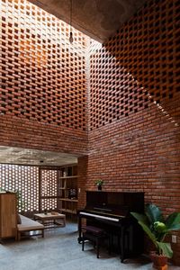 Perforated brickwork used to renovate house in Vietnam