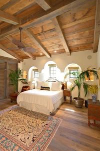 This bedroom was built using random width, reclaimed rustic barn oak flooring and sanded Douglas fir beams and planking in the ceiling. The beams measure 12x12 and 10x10 and the decking is a pattern of 1x12 and 1x6. The corbels and window lintels are also sanded Douglas fir. Products Used: Sanded Douglas Fir Plank, Sanded Douglas Fir Beams, Rustic Barn Oak Flooring